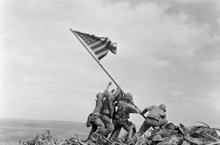 American Marines raising the flag at Iwo Jima, 1945, when fighting fascism was called patriotism. Photo by Joe Rosenthal, public domain.