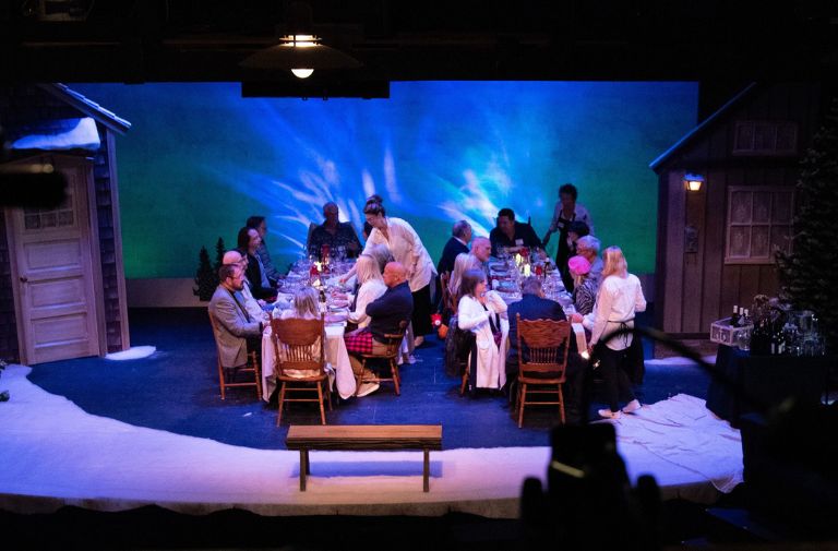 Guests are served on stage at the historic playhouse. Photo by Bob Miano.