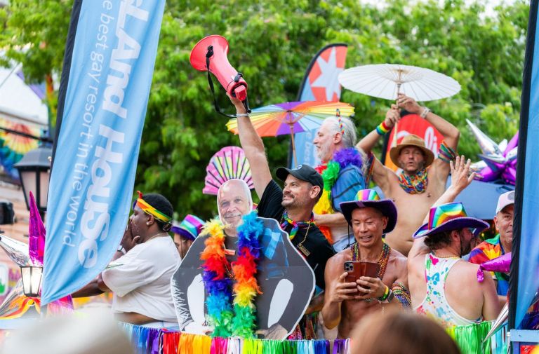 A float by Island House makes its way down a colorful Duval Street. Photo courtesy of KWBG.